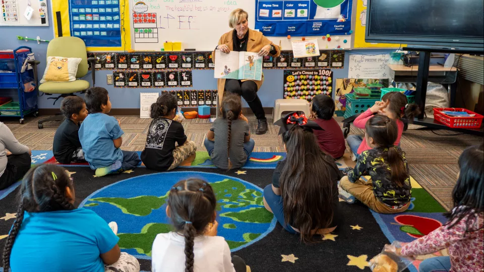 BIE Students listen during story time.